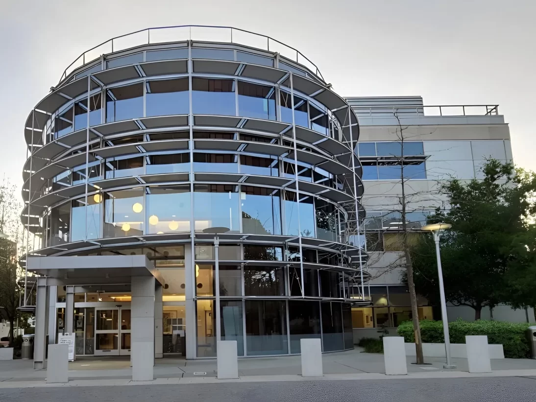 The horizontal shading devices on the curved entrance to the Valley Health Center in Fair Oaks.