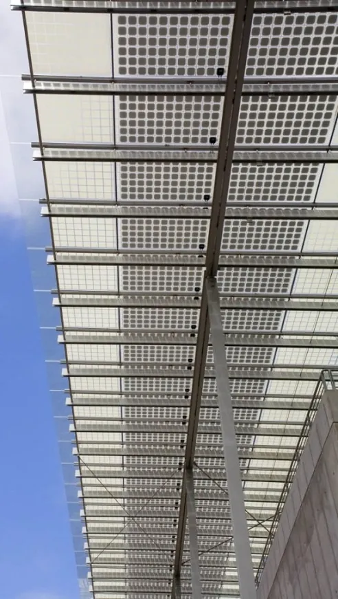 Close-up of the black & white photovoltaic cells on a deep overhang shading device at the California Academy of Sciences.