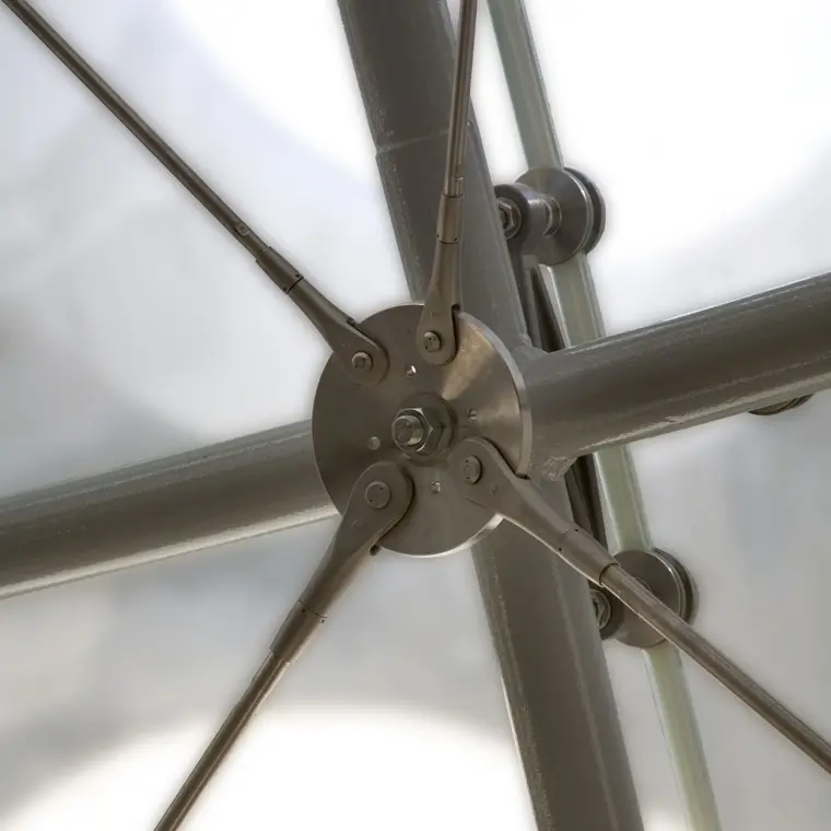 Close-up view of a steel facade connection node on the rainforest exhibit at the California Academy of Sciences.