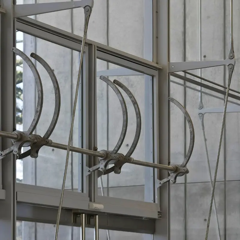 Close-up of a window opening mechanism in the facade of the California Academy of Sciences.