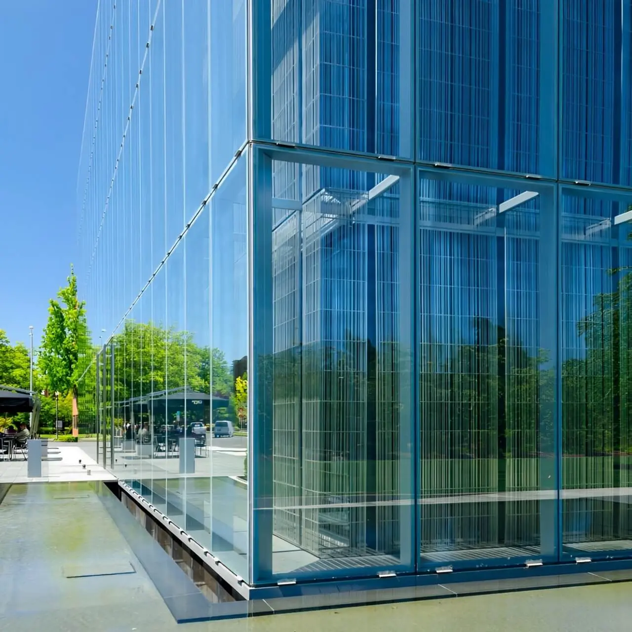A close up of a corner of the blue double-skin facade of the Jaqua Center for Student Athletes at the University of Oregon. 