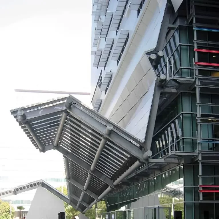 A close-up of the side of the entrance canopy & facade on the Caltrans District 7 HQ building in LA.