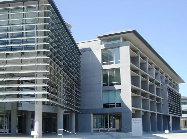 The charcoal and blue glass facade of the Seattle Convention Center.